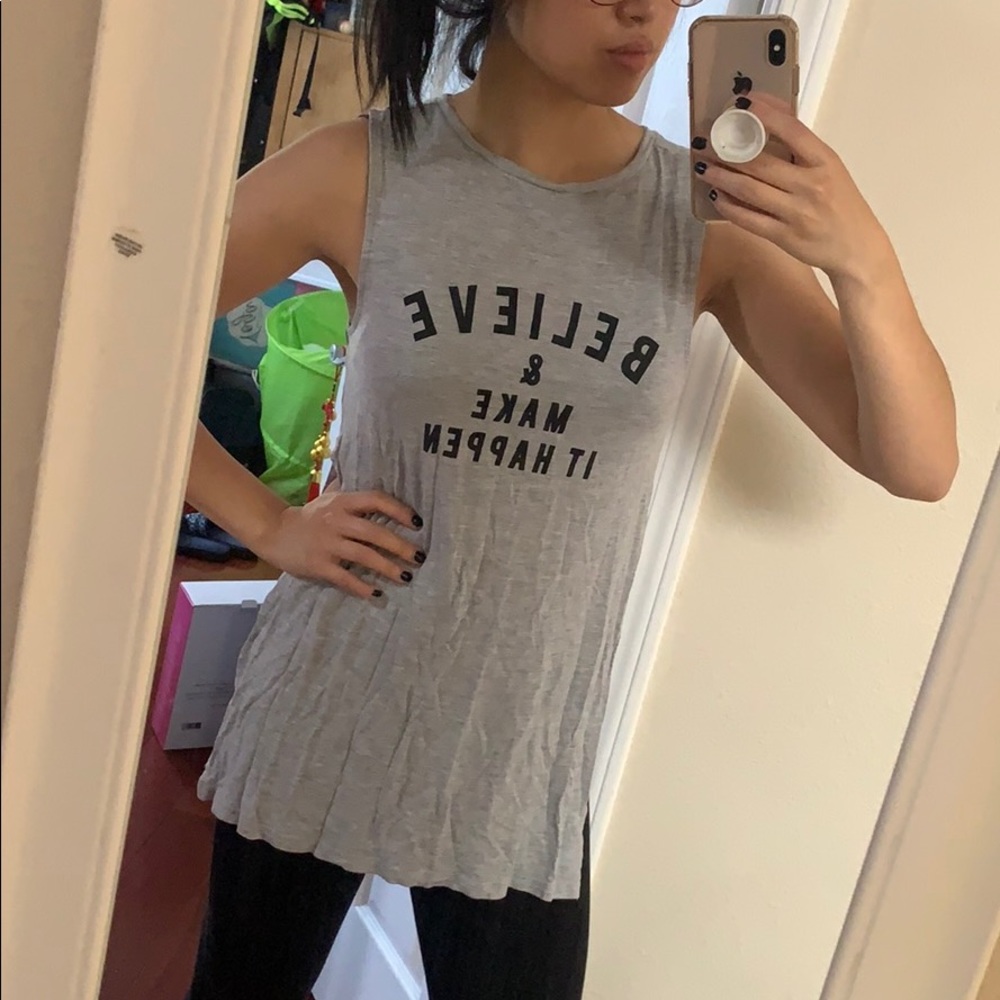 Sleeveless tank top with huge slit on sides